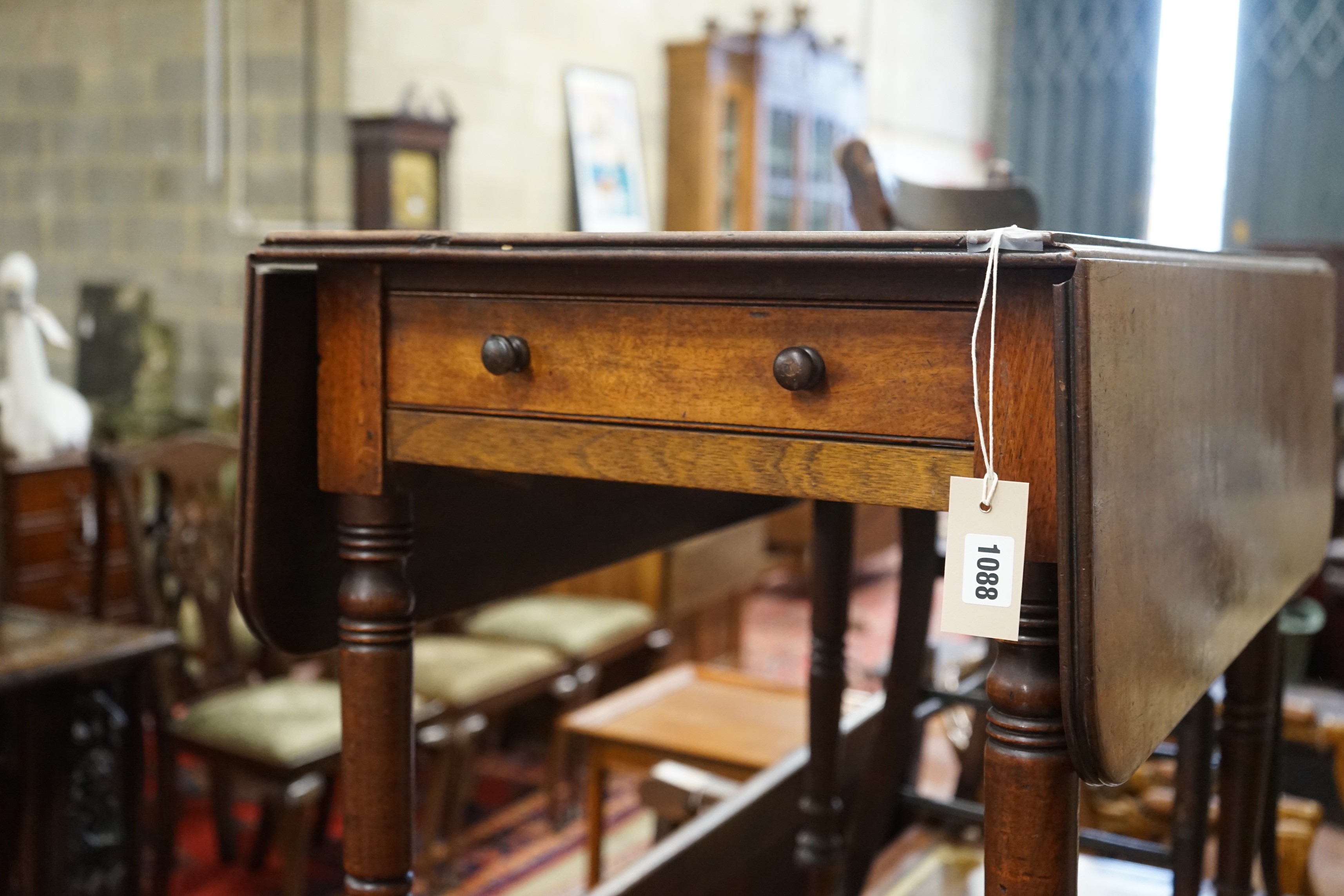 A Regency mahogany Pembroke table, width 84cm, depth 48cm, height 73cm together with a provincial elm wood seat chair